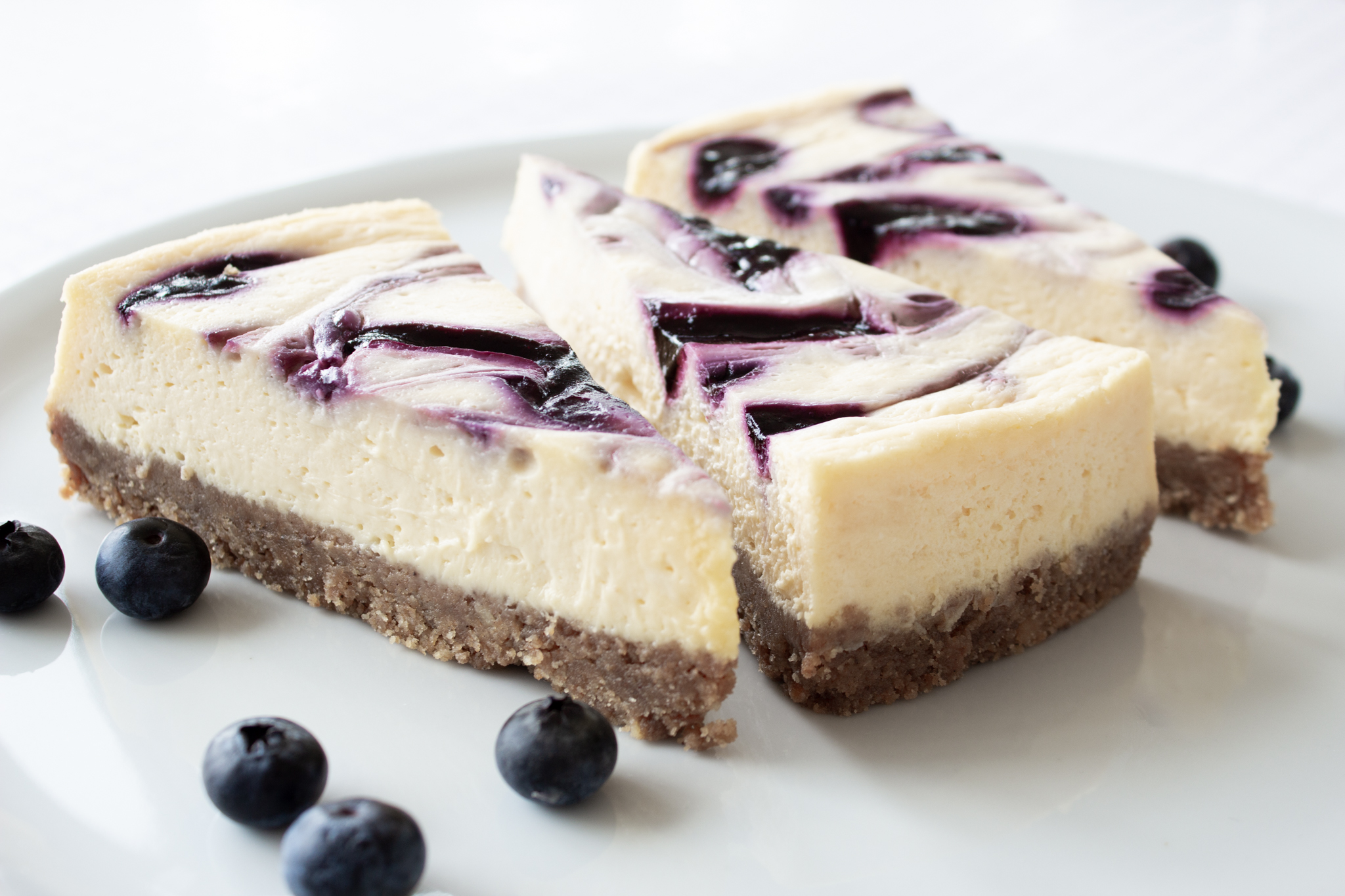 New York Cheesecake mit einem Swirl aus Blaubeeren 3 Stücke
